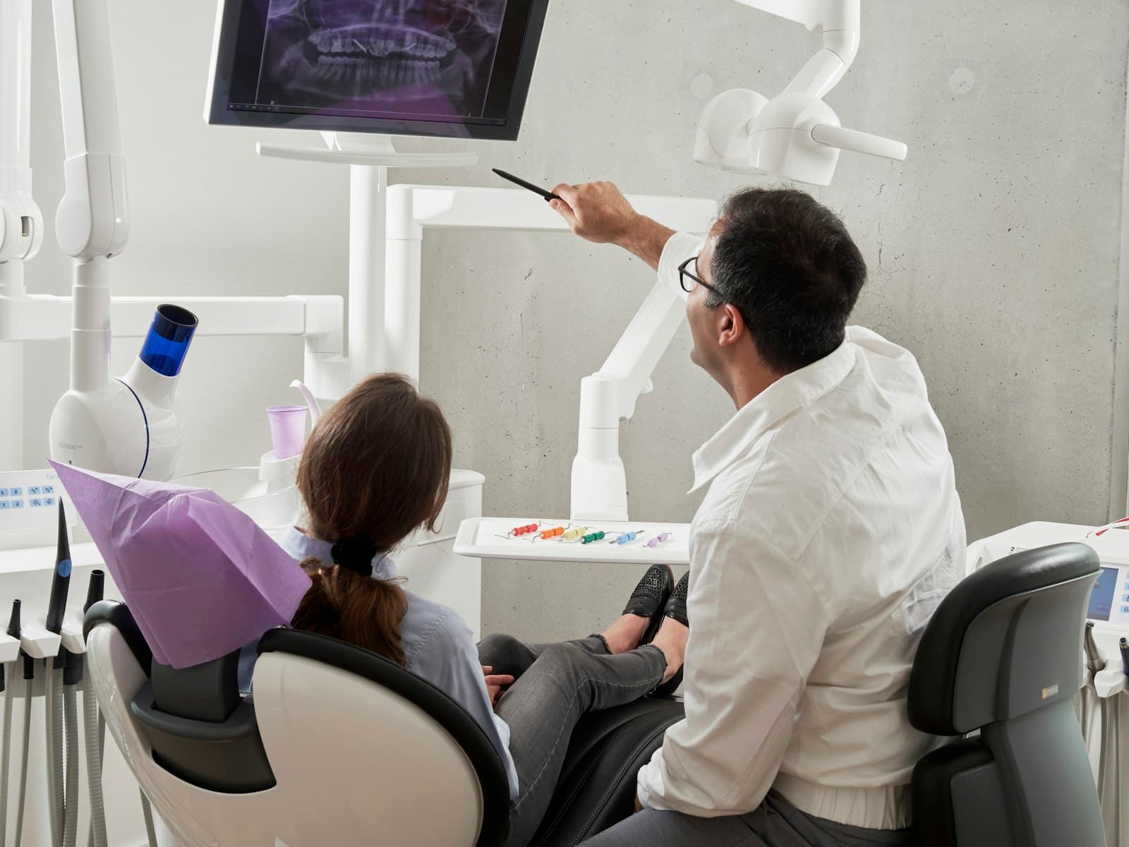 Dentist with smiling patient